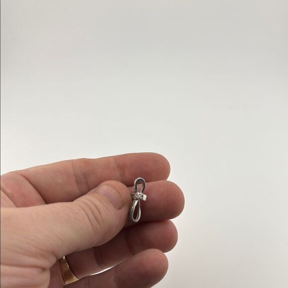 Elegant Sterling Silver Cross Pendant with clear stones - Picture 2 of 3